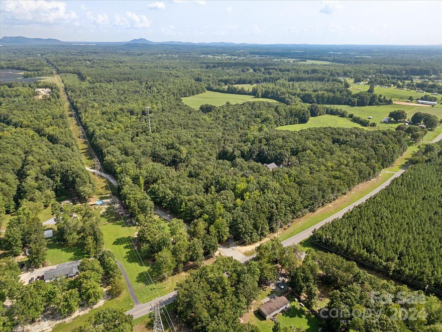 BEAUTIFUL land located in the prime location in Kings Mountain. Only a 12 minute drive to downtown Kings Mountain, less than 20 minutes to the Catawba Two Kings Casino, and about 30 minutes to the Charlotte Douglas International Airport. Either purchase this as your private estate, a compound, OR divide it for multiple home sites (see photos for proposed split). Cell tower is not included in the sale. This land is an absolute GEM! Please do not walk the land without an appointment.