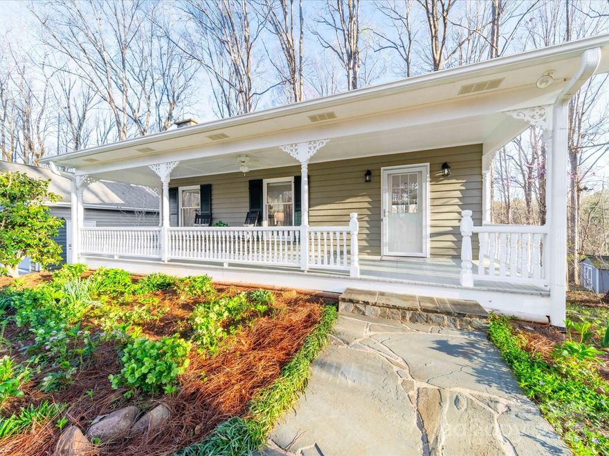 Escape to serene, tranquil privacy on 10.26 acres! Super cute beauty w/a rustic aesthetic. Relax on the vast front covered porch, sipping coffee, having lunch/dinner or hanging w/family & friends.  Inside, bask in natural light & vaulted ceilings for a spacious feel. Open floor plan, large great rm, w/built-in bookcases & FP.  Nice kitchen w/lots of cabs, kit island & counterspace. Nice ext deck w/more scenic views. Primary bedrm on back side w/views, bright bath w/walk-in shower. Basement w/heart pine floors enhance the large rec room w/built-in shelves and cabinetry.  2ndary bath w/claw tub & linen closet. 2ndary bedrm w/door to heated/cooled art studio/workshop. Oversized 2-car garage w/insulated walls & garage doors. Features: New well pump (Jan '25) LVP flooring (Feb '25), fresh paint, popcorn removal (Mar '25). Abundance of wildlife (bluebirds, hummingbirds, finches, etc). Nice working shed in rear yard. A peaceful haven! Future Harris Teeter (Fall '26) is 10 mins away.