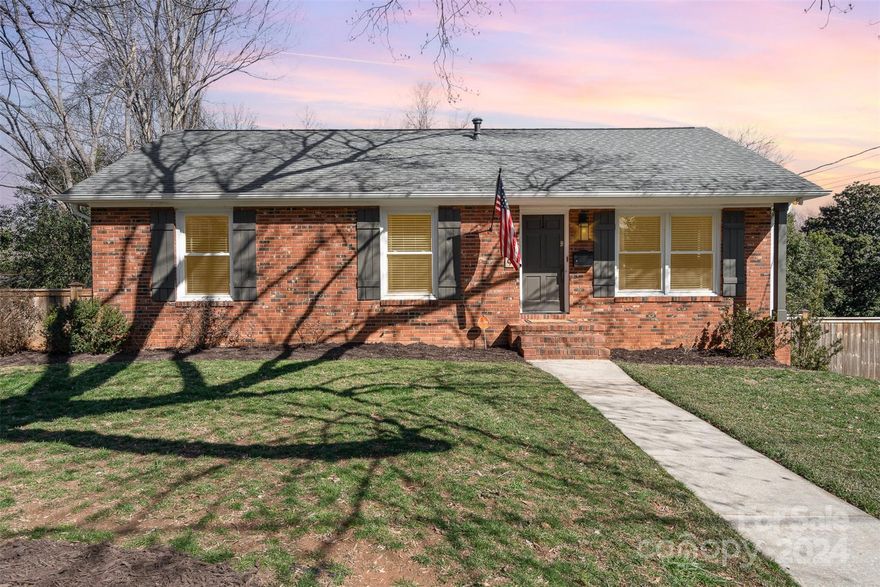 This property, located on a corner lot in the desirable Starmount neighborhood features four bedrooms and 2.5 bathrooms. It offers an open floor plan that allows natural light to flow through the main floor and the kitchen has been updated with modern appliances, including a gas-powered range. On the main level, three bedrooms provide ample space for personalization and rest. The basement is finished with the master bedroom and further equipped with a bar and a built-in mini-fridge, suitable for entertainment or relaxation. Outdoors, there's a patio with a fire pit and an entertainment area, alongside a two-story detached shed, which adds to the storage options. The shed is accessible via a secondary driveway. The backyard is fenced with an electric gate, ensuring privacy and a secure space for outdoor activities.