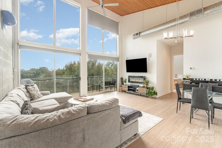 THE EPITOME OF WALKABILITY in PLAZA MIDWOOD home to the new SCOUT HEADQUARTERS!  Welcome to your stunning top-floor condo in Plaza Vu where industrial style meets unbeatable city convenience!  This spacious 2-bedroom, 2-bathroom  unit offers soaring ceilings and oversized windows that flood the home with natural light, giving way to inviting views from your expansive private balcony.  Inside, you'll love the warm, industrial aesthetic—concrete block walls, exposed ductwork, and wood-paneled ceilings combine to create a true loft-like vibe. The open-concept living space is perfect for entertaining or simply relaxing in style.  Need a little shade or privacy? Custom upgraded window treatments allow you to control the light and view to your liking.  Both bedrooms feature ensuite bathrooms, offering privacy and comfort for you and your guests. The primary suite includes a large closet, while the second bedroom easily flexes as a guest room, home office, or creative space.  Just off the living area, you'll find a versatile utility room with in-unit laundry and A UNIQUE SEPARATE STORAGE CLOSET JUST OUTSIDE THE UNIT! Yes your fridge, washer, and dryer are all included for a truly move-in-ready experience!  Roof replaced in 2018, new HVAC in stalled in 2023, new flooring in 2024!  And then there’s the location . . . Once you park your car (in your own assigned space!), you're steps from the heart of Plaza Midwood’s vibrant social scene. Grab groceries literally across the street, stroll to your favorite coffee shops, bars, parks, and breweries everything is walkable.  Quick access to Highway 74 makes commuting to Uptown, South End, Lake Norman, or the airport a breeze.  While city living does come with lots of surrounding buzz, the the building’s solid construction serves as a unique buffer to everyday noise.  Don't miss your chance to own a top-floor condo in one of Charlotte’s most desirable neighborhoods.  Come see it for yourself—and fall in love with life at Plaza Vu.  Parking spot is numbered 233.  Seller stated that water and sewer is included in the HOA dues.  See agent remarks with regard to VA funding possibilites.  There is no elevator in the building.
