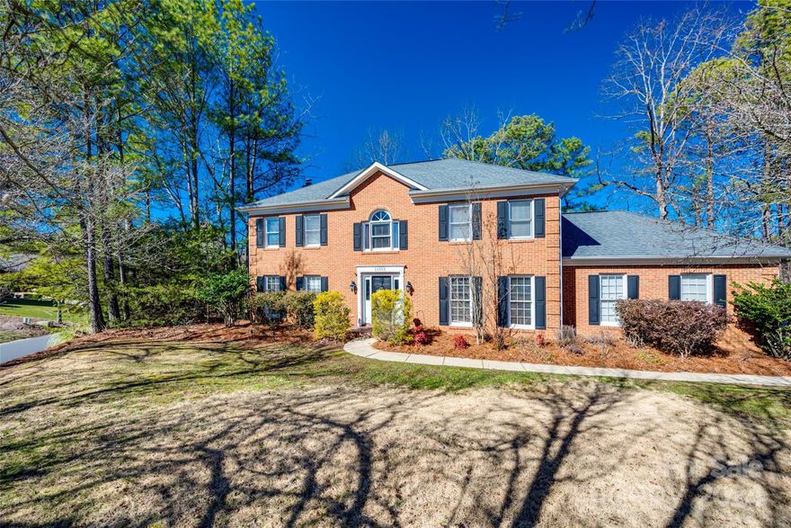 Stately colonial style home in sought after neighborhood of Seven Coves! This stunning, 2-story brick front beauty offers multiple living areas. Cozy up by the wood burning fireplace in the great rm, enjoy spring blooms from the screened in porch or host a dinner party in the formal dining rm.  The kitchen has nice updates including ss appls, granite counters, new microwave & dishwasher & tons of cabinet space. Upstairs features 4 bdrms, open loft that can be used as a playroom/home office. AND do not miss the unbelievable primary suite & bath with double vanity, whirlpool tub, tiled shower & walk-in closet. The backyard oasis awaits you with a deck for grilling, fire pit for roasting marshmallows & beautiful landscaping w/ shade from a canopy of mature trees. 2 car garage w/ new garage doors & wifi motors. The cherry on top? No HOA.  Walking distance to nature trails, community amenities & convenient to shopping, restaurants & major highways leading to Charlotte. This one has it all!