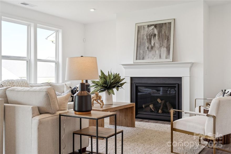 PRICE IMPROVEMENT! Ask your sales consultant about our limited time special incentives! Enhanced landscape package included. See agents at Sales Office. The Woodrow is part of our luxury Cottage Collection and is an immediate charmer! The airy, foyer hallway runs leads you into the open great room. Overlooking a bright casual dining area, the well-designed kitchen features a large center island with breakfast bar, wraparound counter and cabinet space, and roomy walk-in pantry. Off the 2-car garage entrance you are met with a convenient, mud area and office. The primary bedroom suite is enhanced by a large walk-in closet, stunning primary bath with dual-sink vanity, large soaking tub, luxe shower with seat, and private water closet upstairs. Central to an ample loft is a shared hall bath with dual-sink vanity, laundry room with wash sink, and secondary bedrooms with walk-in closets, one with it's own private bath. Relax and enjoy the seasons on your 10x10, rear covered patio.