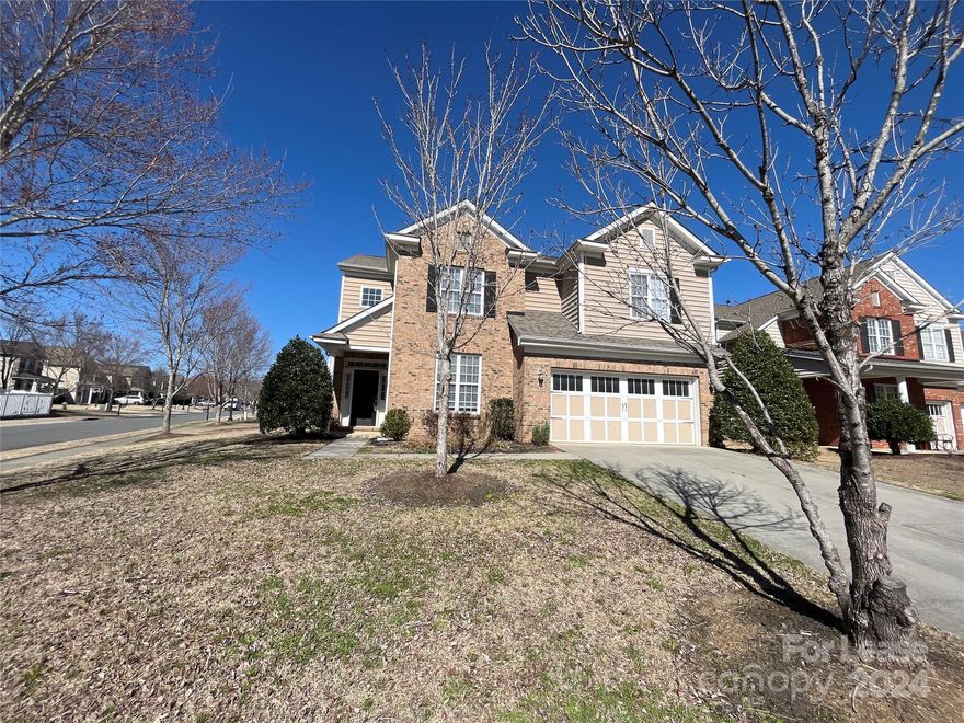 Corner lot 5 bed, 3 bath, 2,812 sq. ft. home in the sought-after Stone Creek Ranch community of Charlotte! This lovely home features a formal dining room with a trey ceiling and chair rail molding and a cozy living room with a fireplace. The open plan with soft archways continues into the eat-in kitchen. Granite countertops, a tile backsplash, stainless steel appliances and an island with breakfast bar add to the convenience and easy cleanup of the kitchen. A backyard patio offers even more space to dine and entertain! Upstairs, the primary bedroom boasts an en suite bath with a garden tub, separate shower, dual vanity and a walk in closet. Four additional bedrooms share another two full baths, rounding out this spacious home.  *Virtually staged photos are included. This home is NOT furnished.