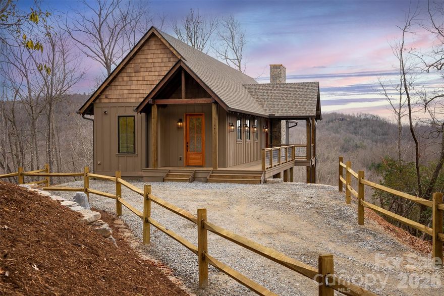Tucked away on just over five private acres, this move-in ready new construction mountain home near Brevard, NC offers the privacy, views, and lifestyle buyers are searching for in Western North Carolina real estate.  Located on a quiet ridgeline in the Stoney Brook community, the home features peaceful mountain sunrises, long-range Blue Ridge Mountain views, and a true sense of escape while still being just 10 minutes from downtown Brevard and Pisgah National Forest hiking and outdoor recreation.  Built by Pinnacle Custom Construction Inc., this brand-new home was thoughtfully positioned to capture natural light, mountain scenery, and year-round useability.  Located at the end of a cul-de-sac, it offers a rare blend of seclusion and convenience.  A private driveway provides primary parking at the home and additional guest or overflow parking available in the cul-de-sac.  This move-in ready new construction home offers modern efficiency, quality finishes, and low-maintenance ownership, making it ideal for full-time living, a second home, or a mountain retreat.  Buyers looking for new construction in Brevard NC will appreciate the ability to enjoy a brand-new home without the timeline, cost variability, and uncertainty of building from the ground up.  Short-term rentals are allowed, offering flexibility for part-time use if desired.  For buyers considering building a custom mountain home, this property offers the advantage of finished new construction quality without extended construction timelines and rising material costs.  It's the kind of home where days feel slower, mountain views feel endless, and coming home always feels right.