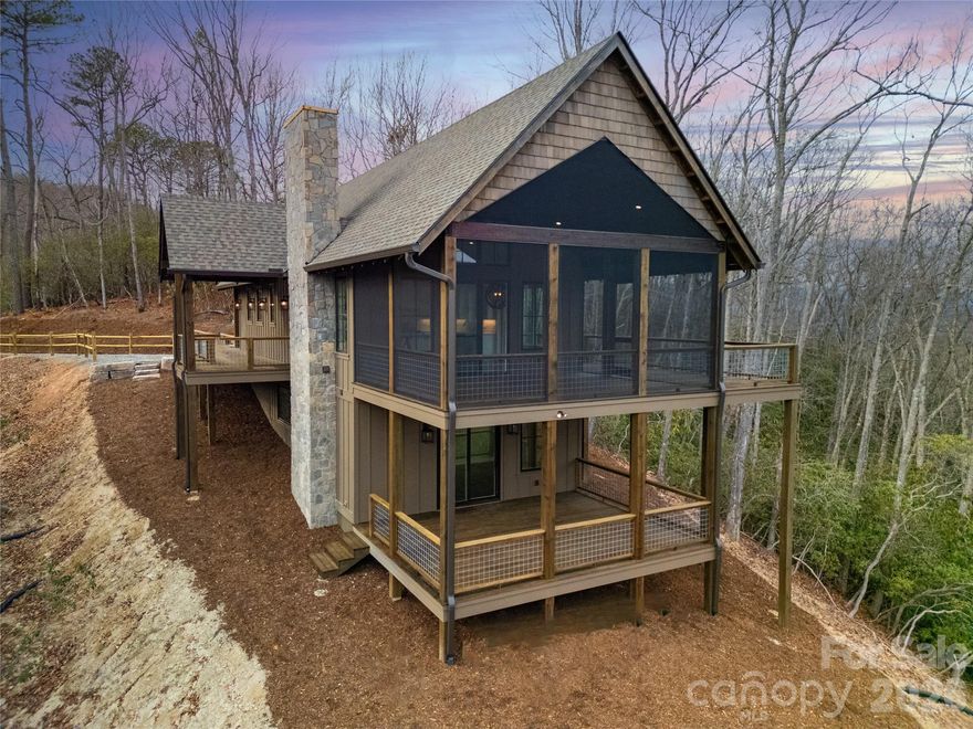 Tucked away on just over five private acres, this move-in ready new construction mountain home near Brevard, NC offers the privacy, views, and lifestyle buyers are searching for in Western North Carolina real estate.  Located on a quiet ridgeline in the Stoney Brook community, the home features peaceful mountain sunrises, long-range Blue Ridge Mountain views, and a true sense of escape while still being just 10 minutes from downtown Brevard and Pisgah National Forest hiking and outdoor recreation.  Built by Pinnacle Custom Construction Inc., this brand-new home was thoughtfully positioned to capture natural light, mountain scenery, and year-round useability.  Located at the end of a cul-de-sac, it offers a rare blend of seclusion and convenience.  A private driveway provides primary parking at the home and additional guest or overflow parking available in the cul-de-sac.  This move-in ready new construction home offers modern efficiency, quality finishes, and low-maintenance ownership, making it ideal for full-time living, a second home, or a mountain retreat.  Buyers looking for new construction in Brevard NC will appreciate the ability to enjoy a brand-new home without the timeline, cost variability, and uncertainty of building from the ground up.  Short-term rentals are allowed, offering flexibility for part-time use if desired.  For buyers considering building a custom mountain home, this property offers the advantage of finished new construction quality without extended construction timelines and rising material costs.  It's the kind of home where days feel slower, mountain views feel endless, and coming home always feels right.