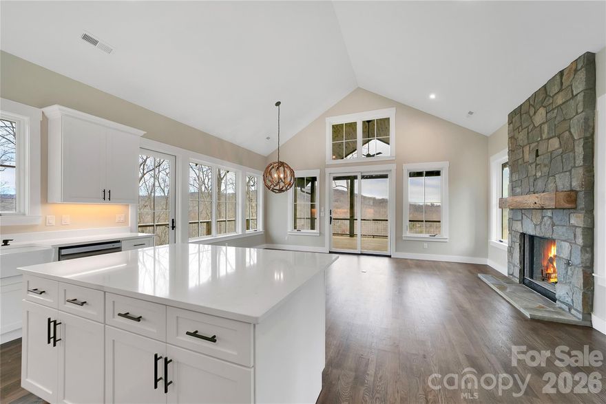 Tucked away on just over five private acres, this move-in ready new construction mountain home near Brevard, NC offers the privacy, views, and lifestyle buyers are searching for in Western North Carolina real estate.  Located on a quiet ridgeline in the Stoney Brook community, the home features peaceful mountain sunrises, long-range Blue Ridge Mountain views, and a true sense of escape while still being just 10 minutes from downtown Brevard and Pisgah National Forest hiking and outdoor recreation.  Built by Pinnacle Custom Construction Inc., this brand-new home was thoughtfully positioned to capture natural light, mountain scenery, and year-round useability.  Located at the end of a cul-de-sac, it offers a rare blend of seclusion and convenience.  A private driveway provides primary parking at the home and additional guest or overflow parking available in the cul-de-sac.  This move-in ready new construction home offers modern efficiency, quality finishes, and low-maintenance ownership, making it ideal for full-time living, a second home, or a mountain retreat.  Buyers looking for new construction in Brevard NC will appreciate the ability to enjoy a brand-new home without the timeline, cost variability, and uncertainty of building from the ground up.  Short-term rentals are allowed, offering flexibility for part-time use if desired.  For buyers considering building a custom mountain home, this property offers the advantage of finished new construction quality without extended construction timelines and rising material costs.  It's the kind of home where days feel slower, mountain views feel endless, and coming home always feels right.