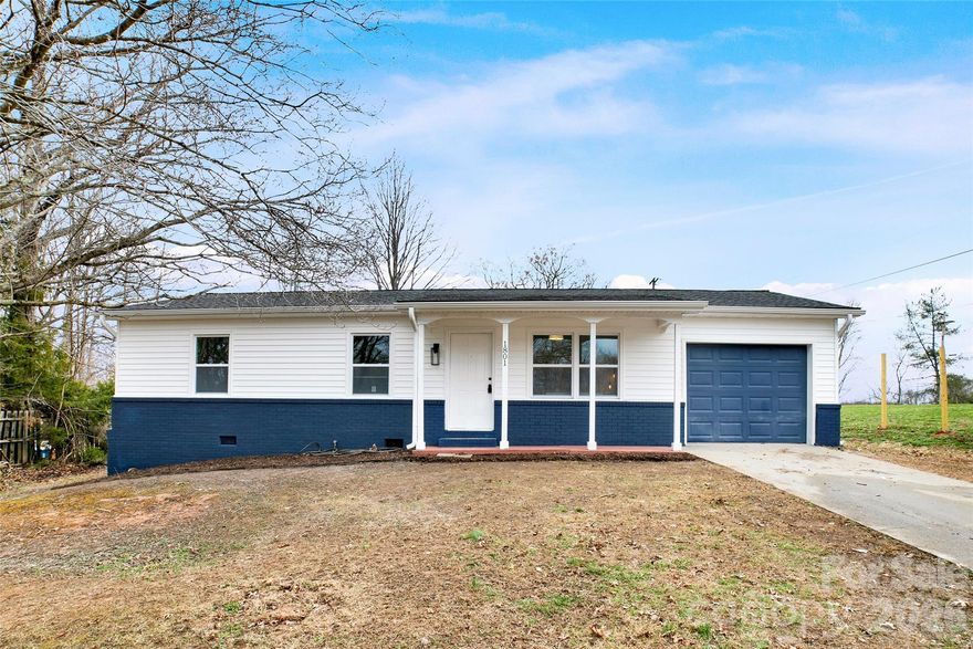 This beautifully updated 3 bed 1 bath home is move-in ready. Featuring a brand-new roof, new energy-efficient windows, and fresh paint throughout, creating a bright and inviting interior. The stunning new kitchen showcases brand-new cabinetry, elegant quartz countertops, and modern gold finishes — perfect for both everyday living and entertaining. New stainless steel stove, hood fan, and dishwasher are included. Durable luxury vinyl plank flooring runs throughout the home, offering  carpet-free living and easy maintenance. Step through the new sliding door onto a brand-new deck that creates a seamless indoor/outdoor connection — ideal for relaxing, grilling, or hosting guests. The remodeled bathroom includes a new tub/shower combo, and all new fixtures with clean, contemporary finishes. Home includes: new electric water heater, new HVAC system including air-conditioner, all offering peace of mind! Property offers a substantial yard for your imagination on a dead end street. Ideally located with quick access to I-40, this home offers an easy commute to Hickory and Asheville while being just minutes from downtown Morganton. Enjoy convenient access to shopping, dining, medical facilities, schools, and everyday essentials — all close to home. A turnkey opportunity perfect for first-time buyers, downsizers, or investors looking for low-maintenance living with modern updates.
