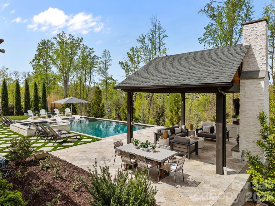Some homes just feel right the moment you pull up. This one is that home. The backyard is where this home truly earns its place in the luxury market. A saltwater Gunite pool and spa, expansive decking, screened porch, and a covered patio with a fireplace and conversation area, all framed by professional landscaping that’s as beautiful as it is private. This is outdoor living done right. Tucked in one of Cornelius’ most sought-after neighborhoods, and zoned for Hough High School, it’s minutes from the water, dining, and energy of Lake Norman. This 5-bedroom, 4.5-bath home, with a dedicated office and bonus room, is the kind of place that’s genuinely hard to leave. Inside, the layout just works. Soaring ceilings and an abundance of natural light set the tone, while the open flow makes everyday living feel effortless and entertaining feel like a breeze. The chef’s kitchen sits right at the heart of it all with beautiful finishes, plenty of prep space, and a natural connection to the living areas that keeps the host in the conversation. Need a quiet place to work? The dedicated office has you covered. Want a flexible space for movie nights, a playroom, or a hangout spot? The bonus room (with doors) delivers that too. A 3-car garage, direct Greenway access, and a location close to top schools, shopping, and the lake round out a home that checks every bo, and then some.