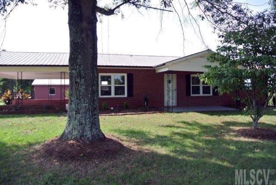 Looking for a brick home, newly remodeled with finished basement? Better call fast this one will not last! 4 BR, 2 BA, over 2500 heated sq ft. Detached garage & double carport attached. New kitchen, bathroom, wood floors, tile & windows. Level, corner lot.  Home is to old to verify bedrooms on septic possible 3 bedroom septic.