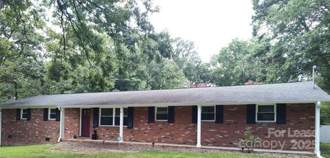 Photo of 303 Cedarwood Lane, Matthews, NC 28104 (MLS # 4304919)