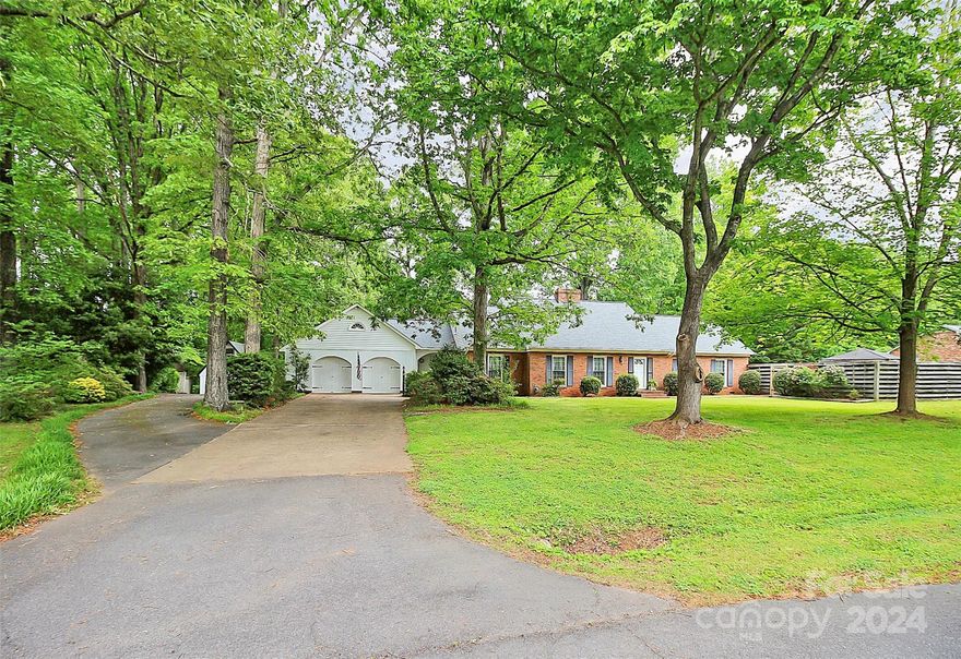 Nestled in this quaint historic Rock Hill neighborhood (Fairlawn) and built on 1.01 acres is truly a hidden treasure.  Located only minutes from downtown and the interstate, property offers the best of everything this area has to offer.  Shops, restaurants, grocery stores, hospital and medical offices are all within a two mile radius.  Featured with this home are two large workshops.  A large in-ground pool with gazebo and shade area, RV parking space with electrical hookup, total roof replacement is two years old, new triple pane windows, all new PEX piping throughout, manicured lawn, shade trees and towering Oaks.  The home has plenty of privacy and no city taxes.  Heated living area is 3,126.  The detached workshops are custom built, perfect for woodworking, ceramics, a studio, endless possibilities.  The first workshop is 461 square foot with a second floor that is 292 square foot.  The second workshop is 785 square foot, solid oak flooring, heat, air and water.