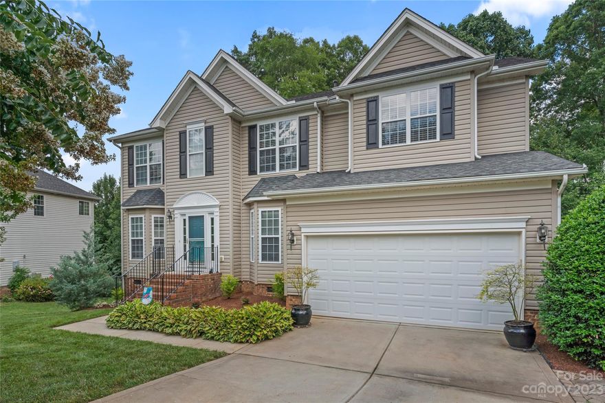 Welcome to this 5 bed, 3 full bath, single-family home in desirable Waterstone neighborhood. You'll be captivated by the pride of ownership showcased by the original owner who has meticulously maintained this residence throughout the years, with many updates, including a gourmet kitchen. One of the bedrooms with full bath are thoughtfully located on the main floor, providing a private and accessible space for guests or family members. Outside, you'll be enchanted by a private backyard backing up to the woods. The paver patio w/firepit sets the stage for cozy gatherings. An additional highlight of this home is the large walk-in crawl space, offering ample storage space for all your household belongings. Take a short walk to the community pool or enjoy easy access to I-77, making this home central to many of life's daily needs. Additionally, award-winning Fort Mill schools are just a short drive away. Stairwell chandelier, kitchen pendants and breakfast nook light WILL NOT convey.