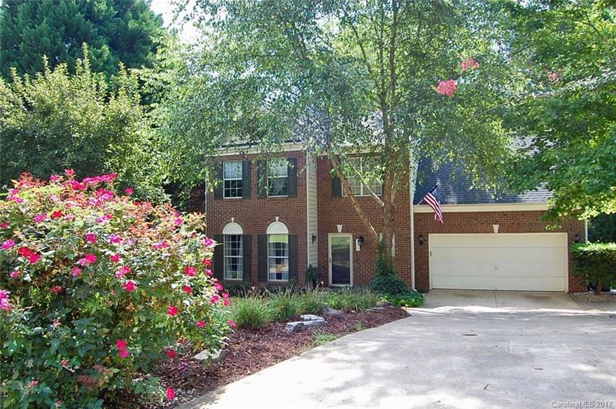 Lots of natural light in this spacious 4 bedroom, 2 story home. New granite in kitchen, refinished cabinets and tile backsplash.  Newly renovated spa like Master bath with custom dual head shower. Upstairs has new carpet.  Updated lighting and plumbing fixtures throughout. Gorgeous landscaping front and back.  Private backyard with massive 600 sq ft deck for entertaining that overlooks a wooded area.  Amazing neighborhood with low HOA fees.