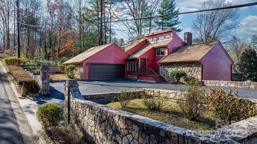 An incredible find! This 4 BR 3.5 BA home is an architectural masterpiece creatively positioned on a great lot w/ views that you normally don’t get in a near downtown property. Step inside to a foyer and you realize you have entered something special. From the foyer step through a brick arch into a large living area with a floor to ceiling brick fireplace and a wall of windows that leads out onto a sun room. Left is a chef’s kitchen w/ 2 refrigerators, and 3 ovens. Enjoy breakfast on the deck off of the kitchen. This floor also hosts a primary bedroom with a vaulted ceiling, it's own deck to enjoy evening sunsets over the mountain range plus an en suite bathroom. Upstairs are 2 bedrooms, a Jack and Jill Bath and a reading nook.  Step down stairs to another large gathering area plus a bedroom & full bath. This area also features windows to enjoy the view. Outside is a patio and a sunset/bird watching tower. Seller has made many updates including siding, a new garage door and painting.