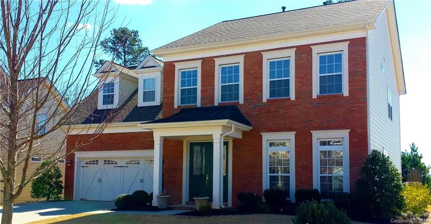 GREAT FORT MILL LOCATION IN RESERVE AT GOLD HILL. Spacious open floor plan w/5 bdrms or 4 plus bonus. 1st flr office w/French doors. Hardwd all main living areas. Kitchen w/abundant storage, dble ovens, granite, ceramic tile backsplash & flr. Lrg, bright, open great rm, double-sided fireplace, sunroom. Premium corner lot backs to natural area, full irrigation. Amenities pool, basketball court, playground.  Great Fort Mill schools, low SC taxes. Easy access to Hwy 77 & uptown. Welcome home!