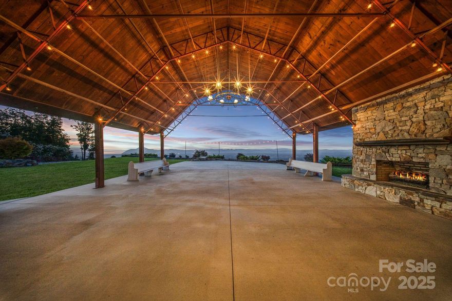 At 2,539 ft elevation, Hidden Hill Venue & Conference Center delivers sweeping panoramic views of Grandfather Mtn, Lake James, Mt.Mitchell & the Black Mtn Range w/ potential for both continued commercial use or a private luxury estate conversion. The centerpiece is a 4,790 sq ft barn-style structure built in 2017, blending the elegance of a southern estate w/ the functionality of an open-concept event space. Soaring ceilings, upscale finishes & seamless indoor-outdoor flow provide a stunning backdrop for weddings, retreats, or residential living. 2024 updates include a new extended patio ($20K), sealcoated driveway, new underground drain pipes & fresh sod across 40% of the front yard. New booster pump, sprinkler pump & water pressure tank. HVAC unit received a new compressor in 2024. Serene & accessible, between Asheville & Charlotte.  70-car parking lot, established vendors & a loyal client base. This is a turn-key venue opportunity—or a mountaintop retreat waiting to be reimagined.