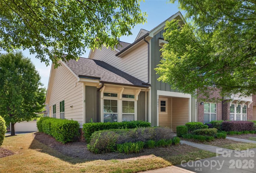 BRAND NEW PAINT, FULLY UPDATED! RARE HIGH CEILING OPEN TWO STORY END UNIT TOWNHOME! in the popular Brightwalk neighborhood. Unique floor plan with the Master Bedroom downstairs & 2 bedrooms and a Loft upstairs. All wells sized rooms. Home has many wonderful features - a covered front and back porch - great to relax on, New LVT Flooring on main level, Fireplace in the Great Room, Stainless appliances (including the gas range), Granite Countertops & Tile Backsplash in the Kitchen, outdoor storage unit, stand alone 1 Car Garage, lots of common area to enjoy & a dedicated laundry room downstairs. Live minutes from Uptown, the Music Factory, Plaza Midwood and NoDa. Camp North End, Double Oaks Aquatic Center & just opened Heist Brewery are within walking distance. Make an appointment today to come out and see this wonderful home!