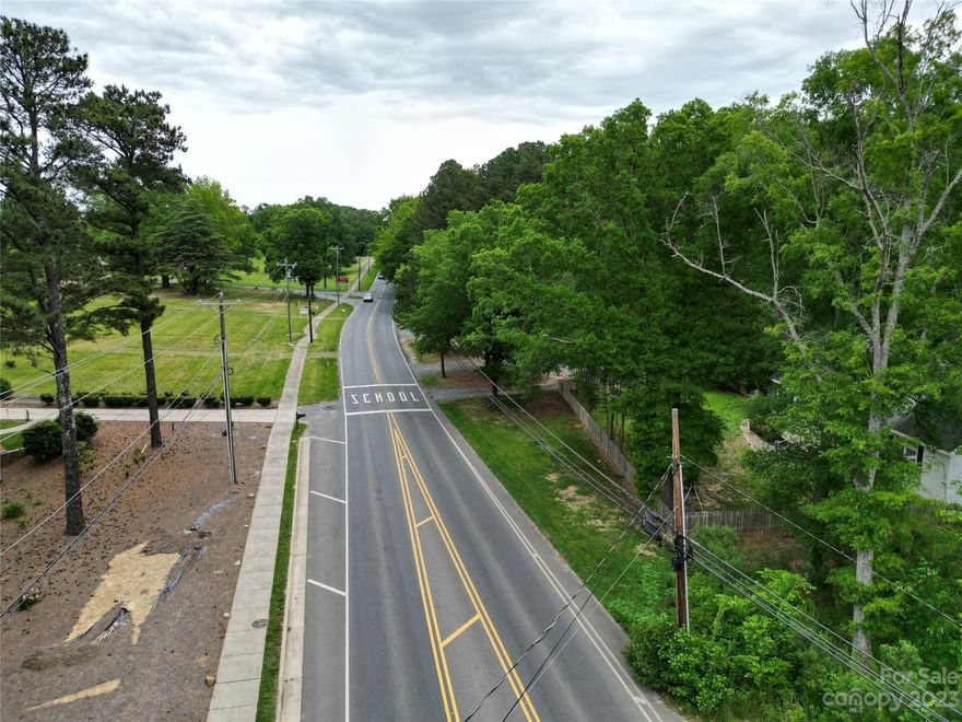 Exciting news! We're offering a fantastic 3-parcel land assembly right in the heart of Indian Trail. Recently rezoned to allow for multifamily living like apartments and townhomes, this property is your ticket to urban development.

With over 1000 feet of road frontage on Waxhaw Indian Trail Rd, visibility is unbeatable. Plus, there's a 2008 sq.ft home included. While the existing home adds value, the true allure lies in the expansive land

City water and sewer services are already in place, making development a breeze. Whether you're an investor or a dreamer, this is your chance to shape the future of Indian Trail's downtown scene.