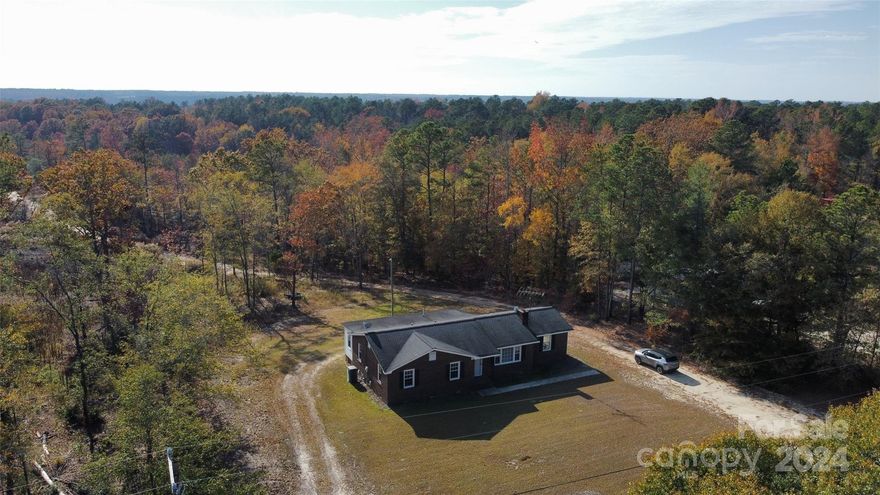 Rare opportunity for all-brick home with significant acreage. Country living but convenient location with shopping, dining, and local businesses nearby...only 2 miles to Kershaw town center. Classic ranch floor plan with 3 bedrooms and 2 full bathrooms. Envision the possibilities with this home with 36 acres -- great hunting opportunities, perhaps develop or subdivide, horse farm, weekend getaway, hobby farm, etc. Approximately 200' of road frontage and approximately 400' wide further back on the property. Depth of approximately 4,200 feet or over 3/4 of a mile. Creeks run along side and back of property...lots of wildlife! Virtual tour of home available. Bring your ideas for updates and finishing touches and come make this yours today! Also listed as MLS#4197166.