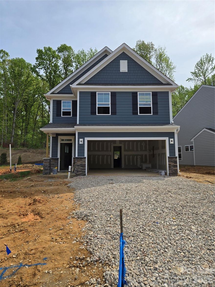 New boutique community in Charlotte near the University area with easy access to dining, retail, and interstates. This 3-story Dillon plan offers 4 bedrooms, 3.5 baths and more than 2,700 square feet of living space. The main living area features the family room, breakfast area and kitchen. The designer kitchen has gray cabinets, quartz counters, tile backsplash, and stainless appliances including a range hood & gas cooktop. Upstairs features the primary suite with a luxury shower and large walk-in closet. The upper floor is completed with two more bedrooms, a hall bath with tub/shower combo, loft, and laundry room. The third floor has a loft, a large bedroom, and full bath with a tub/shower combo. The rear of the home features a covered porch and 12' x 12' patio. Visit today and find out more about this exciting new community!