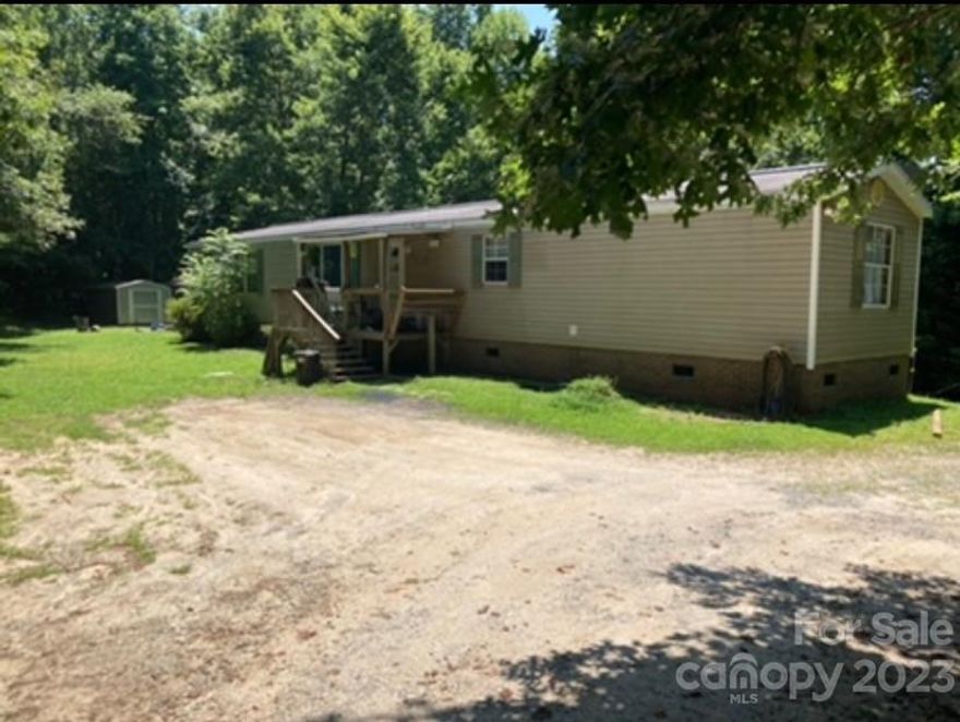 Home that is close to I 40 and Lake James, only 2 miles from I 40 and 15 minutes to cancel bridge boat launch and marina. Single wide that is well taken care of, could be a nice weekend getaway or rental property. This home has 2 bedrooms, 2 baths, the primary suite has a 2 closets. Comes with all appliances and 2 sheds a 9X15 and a 12X12. There is enough room in the yard to build a cover or building to house your boat or RV.