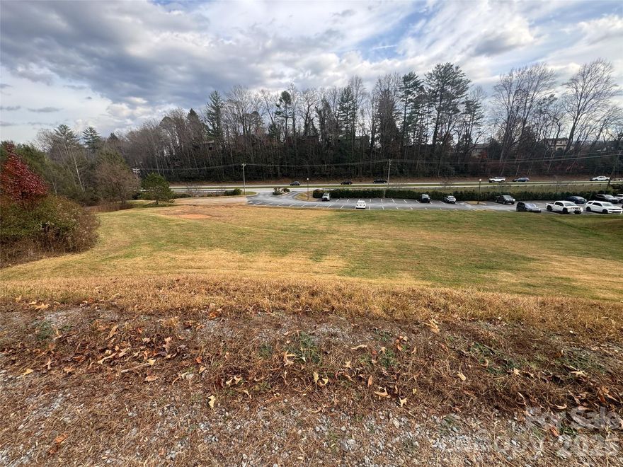 Secure your place in the heart of Straus Park’s vibrant commercial district. We are pleased to offer two highly visible commercial building pads on Market Street, perfectly positioned overlooking the high-traffic US-64 corridor. Zoned Neighborhood Mixed Use (NMU), these shovel-ready sites are designed for substantial growth: Lot L5: Approved for up to a 22,500 sq. ft. building. Lot L6: Approved for up to a 25,000 sq. ft. building. These lots benefit from established infrastructure, including access to city utilities and to the existing Market Street parking. Additionally, there is ample flexibility to add parking to suit your specific density requirements. Join a thriving professional ecosystem of established neighbors, including Food Matters Market, First Bank, Brevard Family Dental, and various physical therapy, CPA, and veterinary practices.