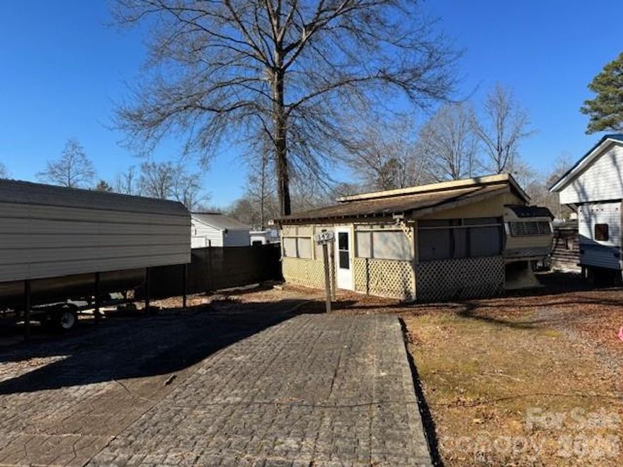 Twin Harbor Campground fixer upper great lot tear down and put your camper or remodel and make this unit your own.  Sellers purchased through courts previous owner deceased, survey has been done, boat shed included.