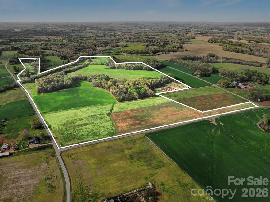 Discover the rare opportunity to own 185.49 acres of beautiful land in Mount Ulla, zoned residential agricultural and ready for your vision. This diverse property features a desirable mix of mature wooded areas and cleared acreage, offering both privacy and usability for a variety of purposes.
Whether you’re looking to build a private estate, develop multiple homesites, create a working farm, or invest in land with long-term potential, this property delivers flexibility and space to make it happen. The natural landscape provides scenic surroundings, abundant wildlife, and the peaceful setting that buyers are seeking.
Conveniently located just 17 minutes from Mooresville, you can enjoy quiet country living without sacrificing access to shopping, dining, and major roadways.
Opportunities like this don’t come along often—large acreage, versatile zoning, and a prime location all in one property. Bring your vision and make it a reality.
 
When driving to the property use 1165 White Road in your GPS.  The property is directly across from this home.