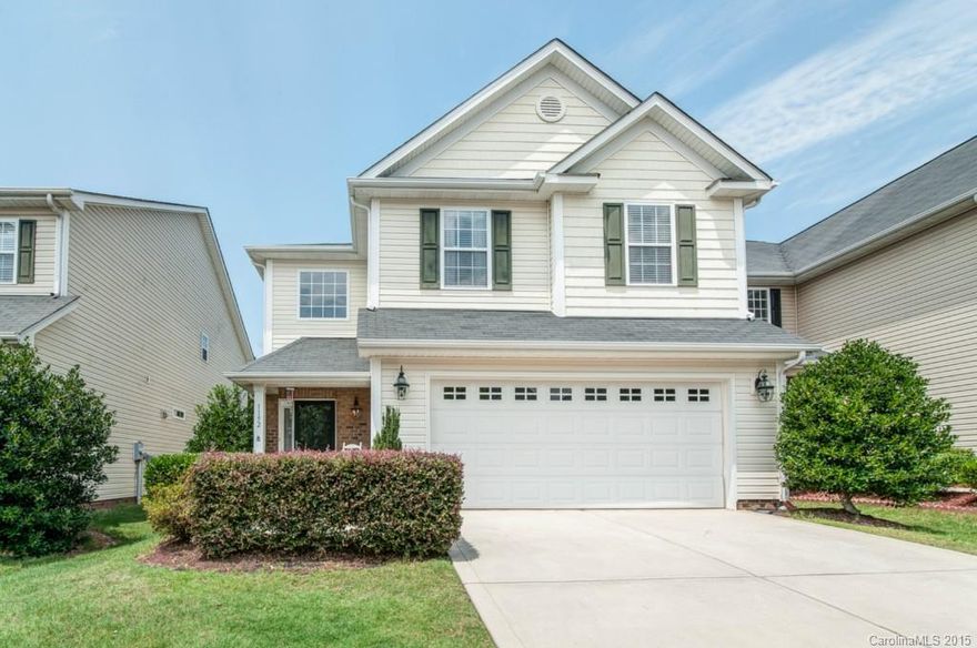 BACK TO SCHOOL SPECIAL - $10,000 price drop, with hardwoods, fenced back yard, & covered back porch upgrades.  Sparkling and move-in ready!  Better than new quality Lennar construction. Wood flooring in family room and dining room.  4 BR, 2.5 BTs plus upstairs open loft area.  Gas log fireplace.  Brand new refrigerator and new microwave.  Window blinds throughout.  Covered open back porch.  White metal fenced back yard.  Two car garage.  Recently built neighborhood with great family amenities.