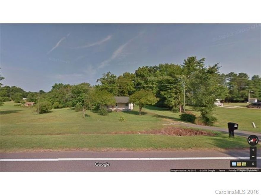 Nice 3+ acre lot. Zoned RC-11. There is an older 3 bedroom home on property. It needs lots of TLC. However home is not warranted and has received no value in sale.