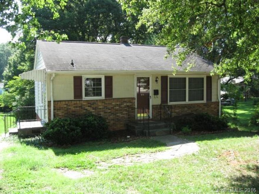 A move in home in a great Belmont location. Walk to Davis Park and nearby schools. Renewed plumbing,roof,windows and bathroom with hardwood floors in all but kitchen and bath. Spacious kitchen with side door entrance and all appliances remain. Gas log fireplace in living room,bedroom ceiling fans too. Storage/Workshop building has many shelves with built-ins and electricity. Very deep wooded lot.Brick and Vinyl Exterior.