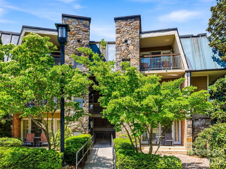 Experience luxury mountain living with this turnkey Studio condo in the Residences at Biltmore, now called Lantern Lodge. Unit 331 offers a seamless "lock-and-leave" lifestyle, sold fully furnished with high-end decor, linens, and kitchenware. The open floor plan features elegant wood flooring, granite countertops, and a stone-accented gas fireplace. Relax on your private balcony after a day of exploring Asheville. As part of a premier resort community, owners and guests enjoy a heated outdoor pool, hot tub, fitness center, and an on-site restaurant. This third-floor unit includes a dedicated laundry closet with washer/dryer. Perfectly positioned for investment or personal use, you are steps away from historic Biltmore Village, the gates of the Biltmore Estate, and minutes from Mission Hospital and Downtown Asheville. This property is fully eligible for short-term rental.