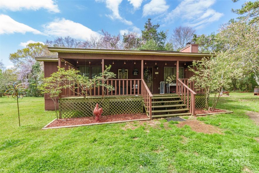 Nestled on over two private acres, this charming 1 bedroom, 1 bathroom home exudes warmth and character. Step onto the quaint covered rocking chair front porch and into the inviting living room, complete with a cozy fireplace, perfect for chilly evenings. The spacious bathroom offers a tub and shower combo, while a bonus room off the dining area leads to a generously sized back deck, ideal for outdoor entertaining or simply enjoying the tranquil surroundings. Whether you're seeking a peaceful retreat or a cozy haven to call your own, this adorable home offers the perfect blend of comfort and serenity.