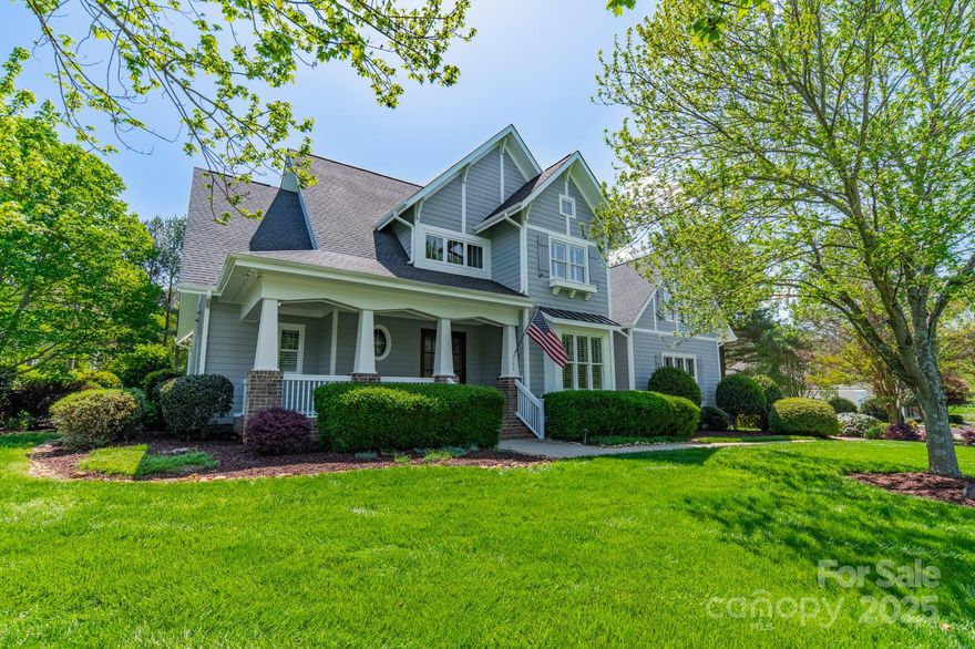 Wonderful custom home by Kingswood on a large beautifully landscaped lot. Private backyard oasis with pool, spa, covered patio, and woodburning outdoor stone fireplace. Enjoy lake access via boat slip #7 at Pier Q just around the corner! Inside you'll find a floor plan with beautiful flow & excellent functionality for both entertaining & daily life. The primary suite on the main level includes a spacious bath with tiled shower, dual vanities, Jacuzzi tub, walk-in closet and sauna. Well-equipped kitchen including a Thermador, stainless, 6-burner gas range with grill top & double ovens, oversized Jenn-Air refrigerator, island with farm sink & instant hot water, breakfast bar, and plenty of cabinets, all open to the vaulted dining area and the great room with built-ins and gas log fireplace. 3 more bedrooms, 2 baths, spacious office, and bonus room up with plenty of storage. New roof (2024), new HVAC (2025) & septic pumped (2025). Come live the good life at Lake Norman & Trump National!