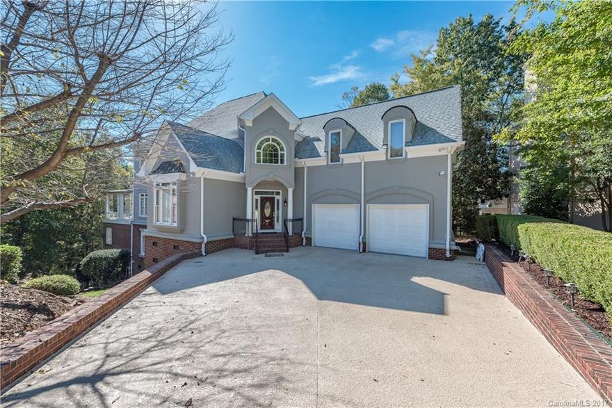 PRICED TO SELL! FOUR LEVELS OF LUXURY LIVING!! Beautifully remodeled golf course home on the 11th green. New Solid counters in kitchen and bathrooms, NEW appliances. brand new floors, and more! Bedroom/Office on main floor. Dual staircase, heavy moldings, wine cellar, huge wrap-around screened porch. Amazing kitchen and luxurious master with sitting area. Huge Rec room or media room. Gorgeous Wine Cellar. Lots of room. Cul-de-sac home. Fantastic golf course views!! This one is a must see!