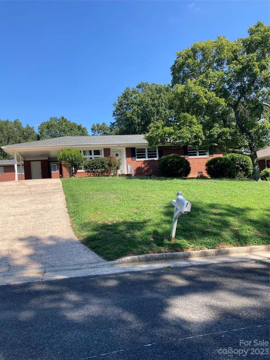 Charming 3 bedroom, 1 bath brick ranch located in Albemarle!  Attached carport with a storage area.  The roof was recently replaced and the home has been professionally painted inside and out.  Beautiful hardwood floors throughout the house. All appliances are included in the large galley kitchen. Established neighborhood with large lots.  Move in ready!