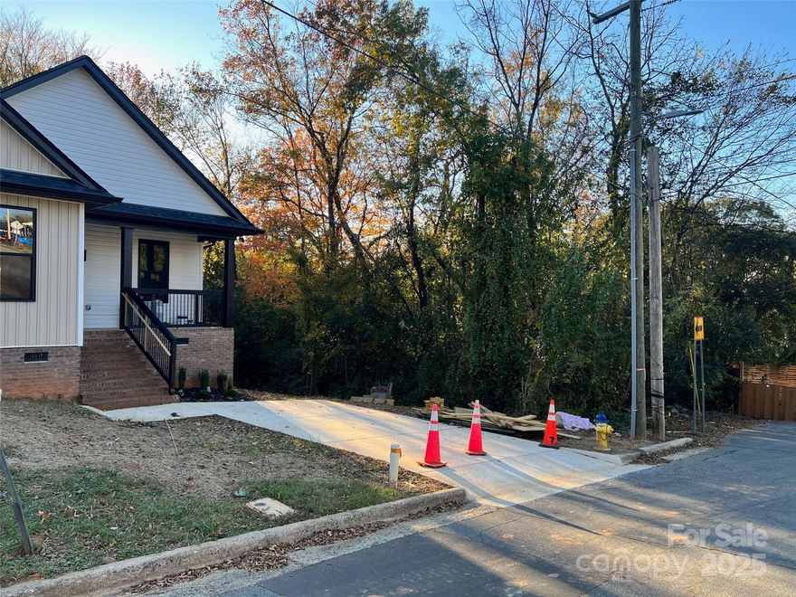 The neighborhood is developing with new construction and renovations! Other developers own lots in the neighborhood, so this could be your opportunity to get in now! New Construction Built on the lot next door. Fantastic Opportunity to Build and Hold or Build and Sell. Public Utilities, tap fee is $5,189 for water and sewer. 

City is moving yellow directional to power or telecommunications pole. U channel and anchors to be removed also. Power pole guide wires tbd if they can be shortened. 

Stake by the fence is not this lot’s property marker. This lot has 52ft of road frontage and the lot with the new construction house built to the left has 50ft of rd frontage. Please contact listing agent with additional questions or to schedule a showing!