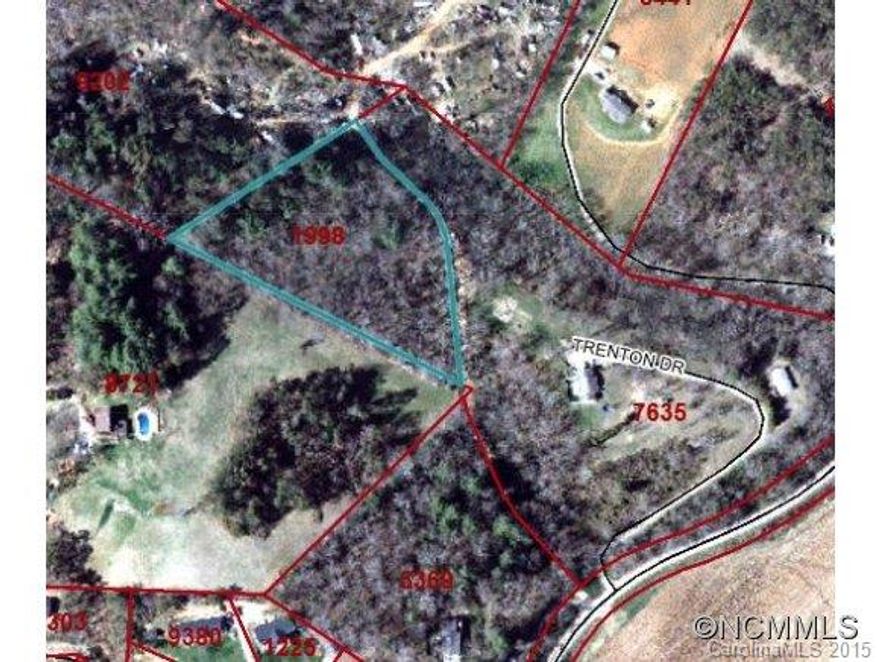 2.6 acres of wooded lot. See right of way access on deed. 20 minutes to Asheville. Priced Below Tax Value !