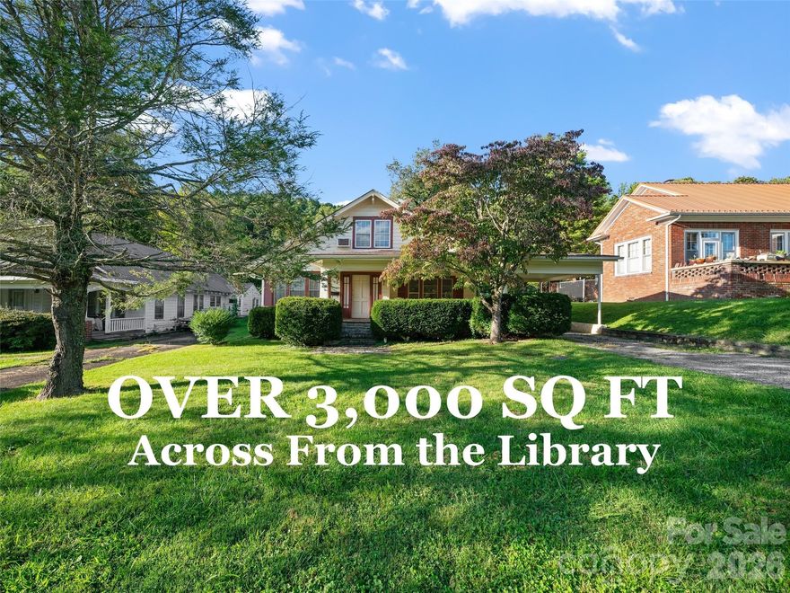 OVER 3,000 SQ FT HOME ACROSS THE STREET FROM THE LIBRARY! Good luck finding something nicer at $90/sq ft. And have you looked at costs to construct? This has that space you have been looking for at a bargain price. Have your agent run a search for you and see if they can find anything even close to comparable that isn't a trailer at that price per square foot. Not to mention this place was built 100 years ago when they cared about the details. Built-ins, tall ceilings, nooks, half-hexagon windows, amazing wood floors, etc. This place oozes with character. The front of the home is south facing so on those long winter days light floods the living room. You just have no idea how good that is for the soul. The location is incredible as well. The home is directly across from the library. You don't get much better neighbors. And it is only a 2 or 3 minute walk to the cute little shops and restaurants of downtown Spruce Pine. Take a look and make an offer! Agent is broker/owner.