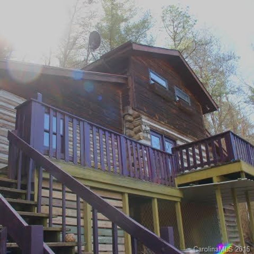 Find tranquility and a simple lifestyle at this sweet hand built cabin tucked away in the mountains of western north Carolina. Just 25 minutes west of Asheville in the Little Sandy Mush community of Leicester, NC.
This unique property could be used as an artist retreat, vacation rental or year round abode. A little cabin under the trees that will capture your heart.