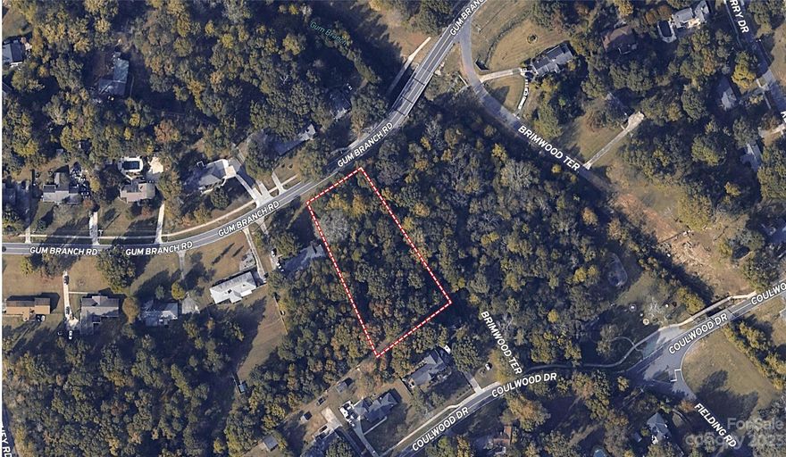 This 1.3+/- acre lot is a rare opportunity in Coulwood! This property has paved road frontage with access to City Water & Sewer, tap fee required.