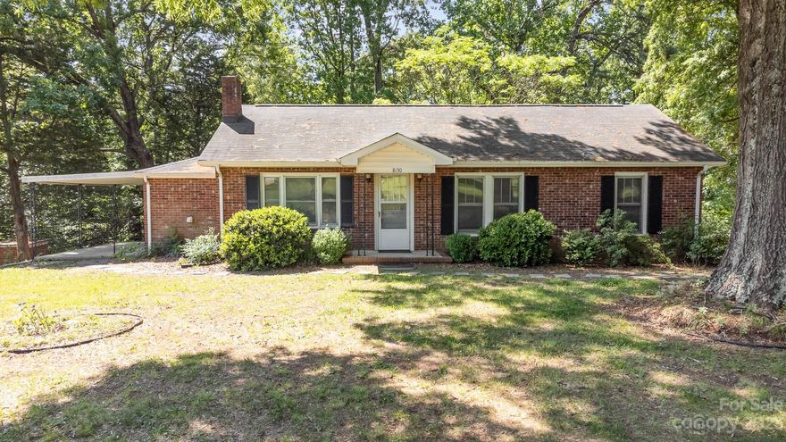 Are you looking for a wonderful location and lovely home to update to your own personal style? This 1270 sq ft home has 2 bedrooms, a library with built-in shelves, a third room with a closet (could be used as a bedroom), living room with built-ins, dining area & kitchen overlooking the very private backyard 1.79 acres in the heart of Mount Pleasant. Surprisingly not city taxes here! The refrigerator, washer & dryer all convey. It is move-in ready so you can fix it up while you live there. Enjoy some of the most sought after schools in Cabarrus County along with small town living with local walking trails, downtown area with sidewalks, fine & casual dining, coffee shop, boutiques, pharmacy, doctor's offices, library and grocery store.