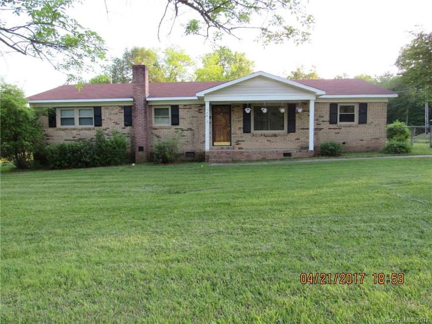 Ready to own your own home? Come see what this home has to offer, 3 bedrooms, 1 1/2 baths, large kitchen/dining area, this brick home has a fenced yard, carport  and large deck on back. Convenient to Hwy 9 Bypass and just outside the city limits. This home is offering a New Flat Screen TV with contract at closing. New Home, new TV, come make it yours.