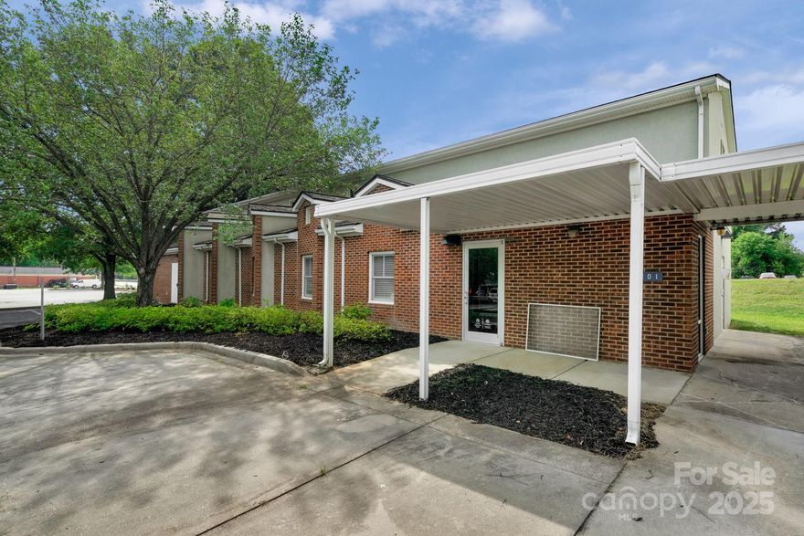 Location, Location! Minutes from MUSC (Medical University of South Carolina)
2 Professional buildings on one property! Lease one out and occupy the other. Building 1 (1201 Colonial Commons Ct) is currently set up as a medical office with about 14 rooms, separate file room, reception area, waiting room. Wired for X-ray room, upper level work area. Building 2 (1203 Colonial Commons Ct) offers three curtained areas, reception area, waiting room area, file room, large open space area, and work stations on upper level. Please see zoning chart from the City of Lancaster attached. New flooring and new roof installed in Building 1. Per the City of Lancaster, this is zoned "PO" Professional Office. Please reference zoning docs attached.