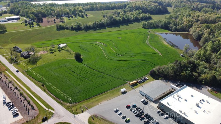 Prime 18 acre parcel on State maintained Murdock Road in Troutman with over 360 feet of road frontage.  Builders, Developers and Investors will be interested in this growing area, close to Interstate 77 off exit 45. Troutman Land Use Master Plan shows 3 designations city will consider for development here; Highway Business, Light Industrial, and Heavy Industrial. This parcel has been rezoned to Light Industrial.  Adjacent to the CATS Center (Career and Technical buildings) belonging to Iredell Statesville Schools South Iredell High School.  Down the road from a large WalMart Distribution Center, and across from a Concrete Plant.  Convenient to grocery, restaurants, and other businesses, and close to the Iredell County Fairgrounds where improvements will include a new agriculture center and farmers market soon to be under construction. Contact listing agent for attachments and Troutman master plan if needed.  Also Listed Under Commercial MLS: 4136618