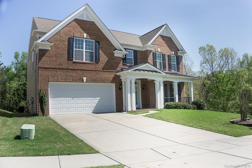 Upgrades galore! Wide plank hardwood on main level,heavy crown molding, tray ceiling in formal dinning room, with chair rail and picture frame detail, open concept family room with gas log fireplace, full guest bed and bathroom on main level. Great bonus room on second level, large master with tray ceiling, heavy molding large walk-in closet. Double vanity in master bath with lots of storage, walk-in shower and jetted tub. Great deck and large stamped patio for entertaining. Sprinkler