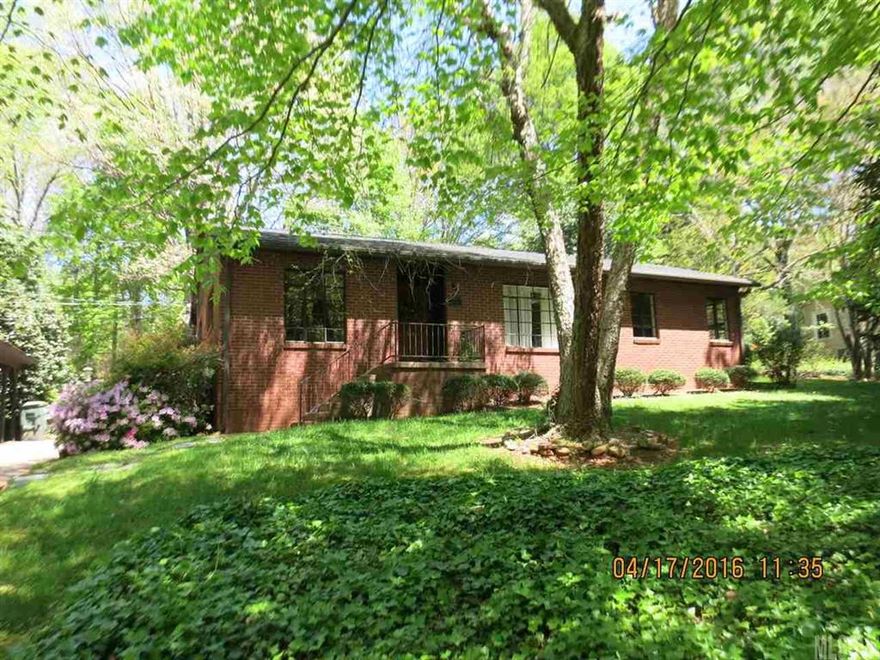 All brick ranch on no through street in beautiful south Newton has original hardwood floors(except one BR)(no carpet), screened back porch and includes rear adjoining lot fronting on East I St. Partial basement with 2nd bath. 30 year roof is only 4 years old. The small storage building on rear lot will remain, as well as the garden shed.