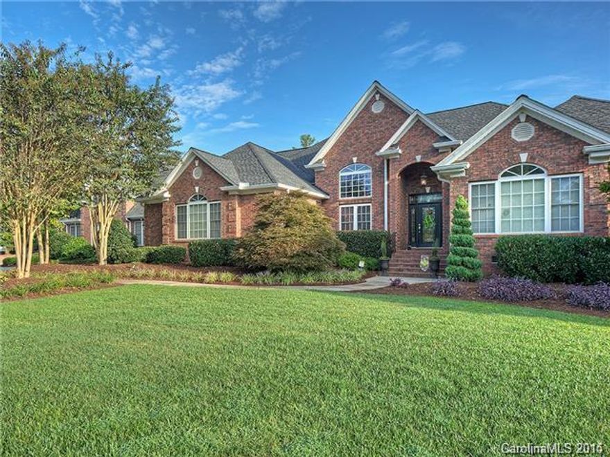 Custom home with spacious living space inside and out.  Home includes a gorgeous in ground pool with covered porches on over 1.2 acres in a private setting.  Featuring a professionally designed kitchen and dining areas with 6 bedrooms and 8 baths.  This home also includes multiple bonus rooms, play rooms, and sunroom with a fully equipped media room. You will be impressed with the 5 car garage with a full workshop and the in home gym and home office.