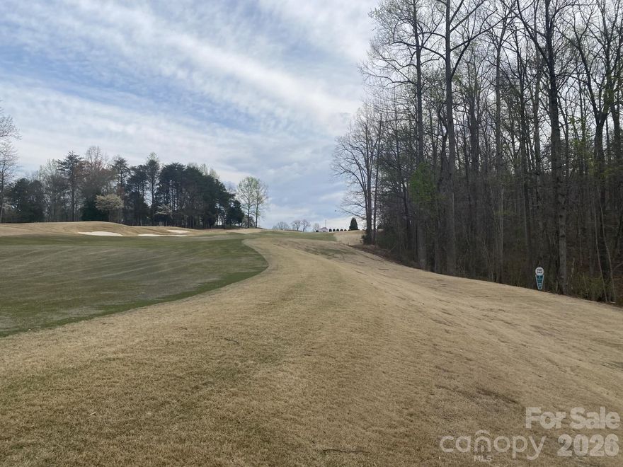 Lot#29 is located on Hole#7 of the Robert Trent Jones Jr golf course, within the Rock Barn Country Club & Spa community.