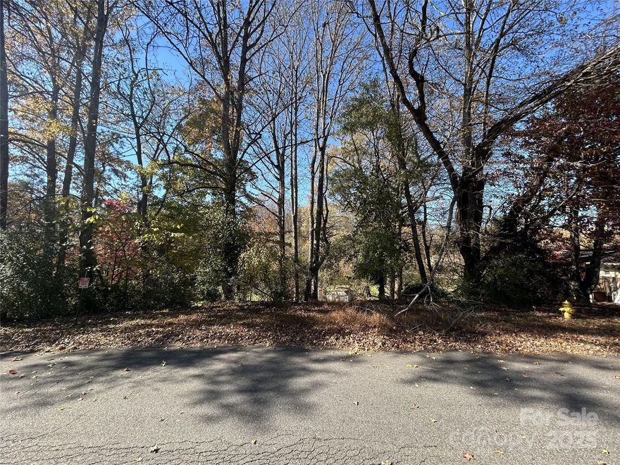 Great opportunity to own a hair below 3/4 of an acre in serene Dalawan Heights of Statesville!! Partially wooded at front of lot near road; good deal cleared in rear of lot. Stakes/flags are already down!! LESS THAN FIVE MINUTES to countless dining, services, retail, businesses, etc. an exciting & attainable opportunity to build YOUR dream home on a large lot in a phenomenal area is within reach!!